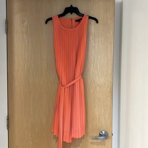 Salmon colored dress. Pull over with belt. Dress up or down